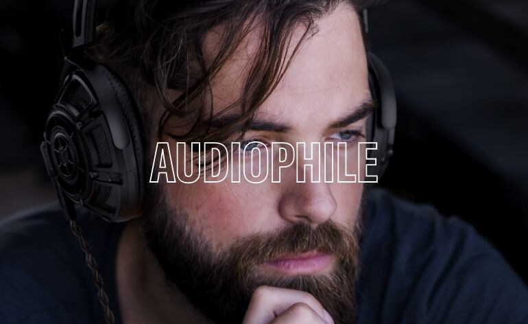 Lifestyle image showing a man wearing Yamaha YH-5000SE black color headphones
